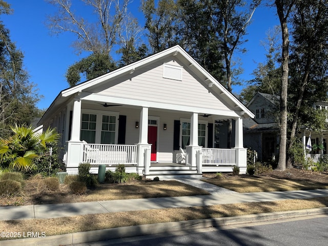 bungalow-style house with a porch and a ceiling fan