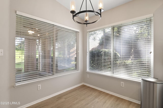 22 Purry Cir, Bluffton, SC 29909 - unfurnished dining area with a chandelier and wood finished floors
