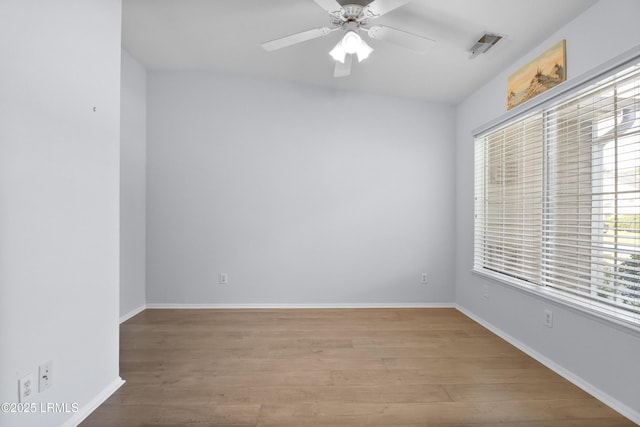 22 Purry Cir, Bluffton, SC 29909 - spare room featuring wood finished floors and a ceiling fan