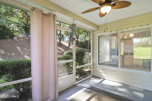22 Purry Cir, Bluffton, SC 29909 - unfurnished sunroom featuring a ceiling fan and healthy amount of natural light