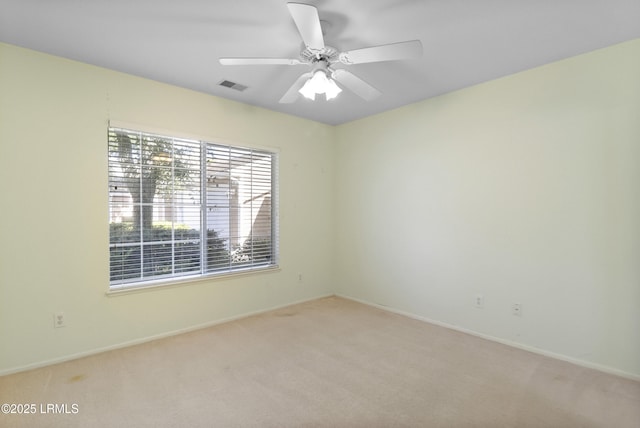 22 Purry Cir, Bluffton, SC 29909 - carpeted empty room with baseboards and a ceiling fan