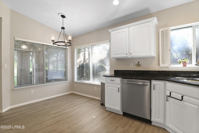 22 Purry Cir, Bluffton, SC 29909 - kitchen featuring dishwasher, light wood-style floors, a chandelier, white cabinetry, and decorative light fixtures