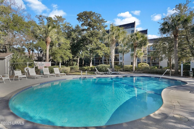 view of pool featuring a patio area