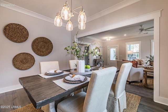 32 Faculty Dr, Beaufort, SC 29907 - dining room with dark hardwood / wood-style flooring, ceiling fan with notable chandelier, and crown molding