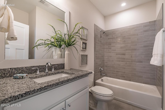 32 Faculty Dr, Beaufort, SC 29907 - full bathroom featuring tiled shower / bath, vanity, toilet, and tile patterned floors