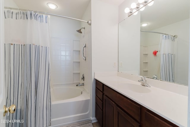 bathroom with vanity and shower / bath combo with shower curtain