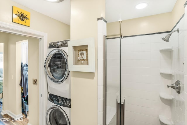 laundry room featuring stacked washer and dryer