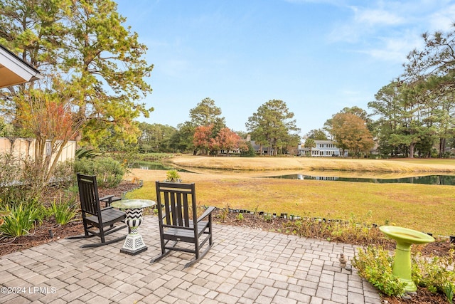 view of patio / terrace featuring a water view