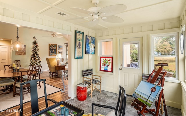 interior space featuring ceiling fan