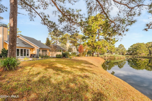 view of yard with a water view