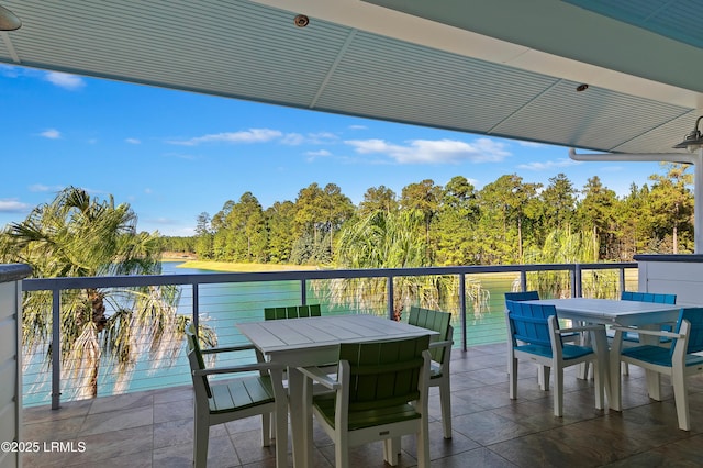 balcony featuring a water view