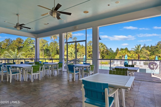 view of patio featuring ceiling fan