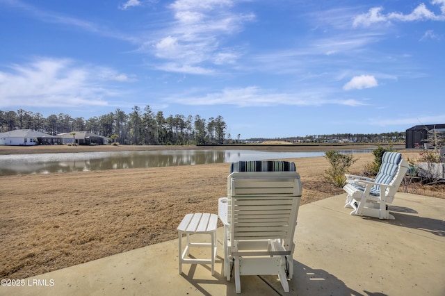 view of patio featuring a water view