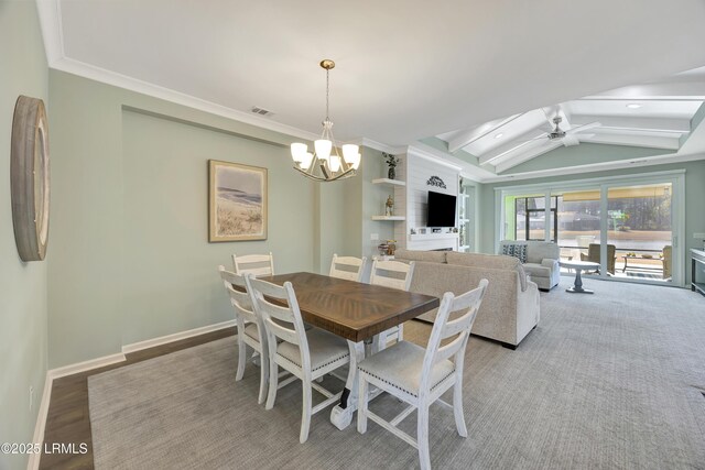 interior space with a notable chandelier, dark hardwood / wood-style floors, and wood walls