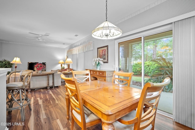 355 Hampton Pl, Bluffton, SC 29909 - dining area featuring wood finished floors, a chandelier, ceiling fan, and crown molding