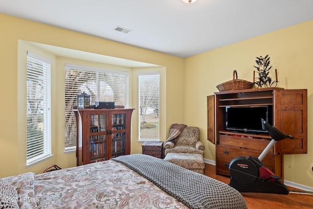 bedroom featuring hardwood / wood-style floors