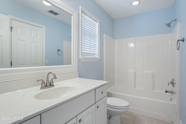 full bathroom with vanity, tile patterned floors, toilet, and bathtub / shower combination