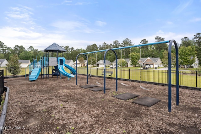 community jungle gym with fence