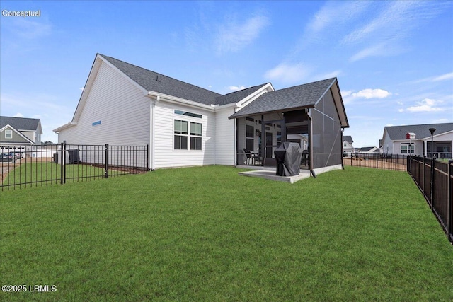 back of property with a sunroom, a fenced backyard, and a yard