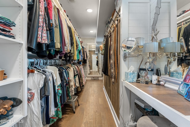 spacious closet with wood finished floors and visible vents