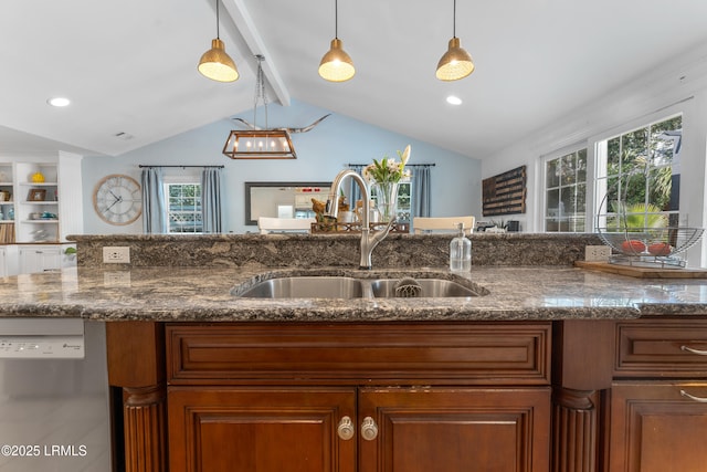 kitchen with dishwasher, brown cabinets, a sink, and vaulted ceiling with beams