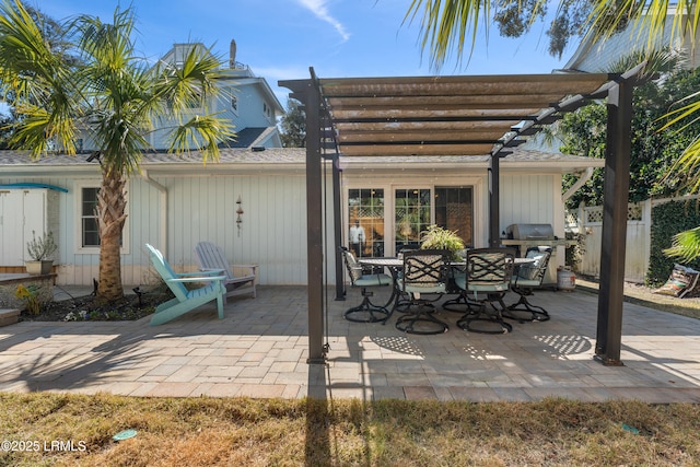 view of patio with fence and a pergola