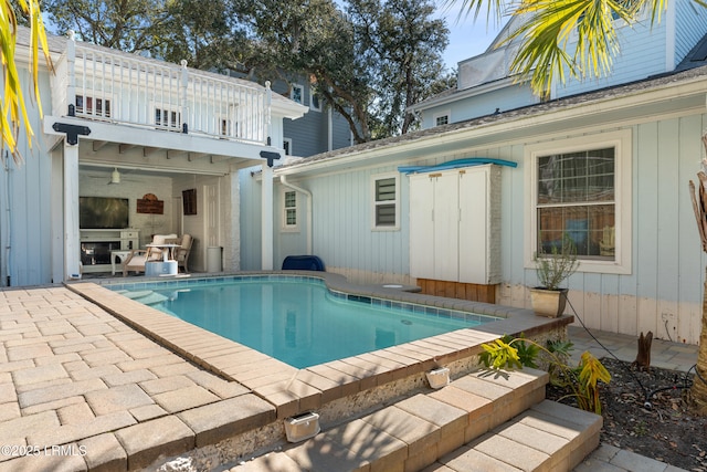 pool featuring a patio area