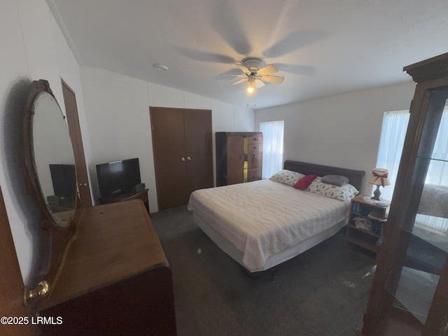 36 Clear Spring Rd, Saint Helena Island, SC 29920 - bedroom featuring multiple windows, a ceiling fan, a closet, carpet floors, and vaulted ceiling