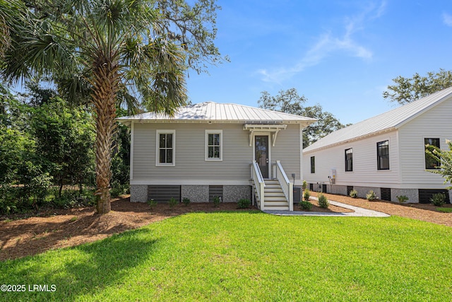 420 Waight St, Beaufort, SC 29902 - view of front facade with a front yard and a metal roof