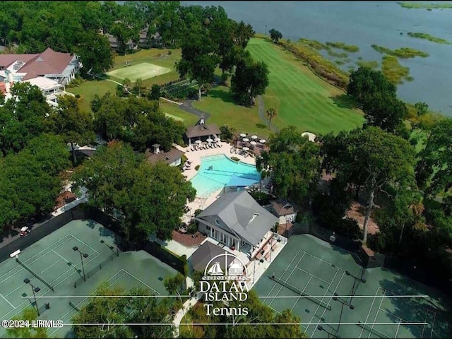 birds eye view of property with a water view