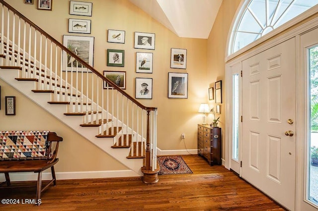 entrance foyer featuring dark hardwood / wood-style floors