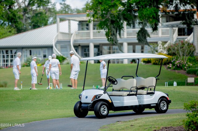 surrounding community with a lawn