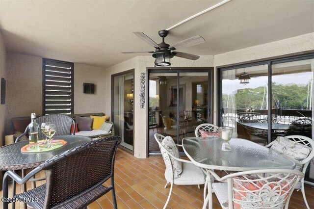 13 Harbourside Ln Unit 7155, Hilton Head Island, SC 29928 - dining space featuring ceiling fan and wood finished floors