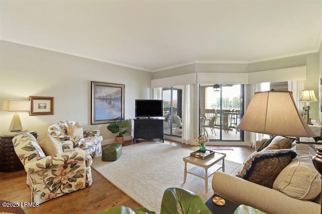 13 Harbourside Ln Unit 7155, Hilton Head Island, SC 29928 - living room featuring ornamental molding and wood finished floors