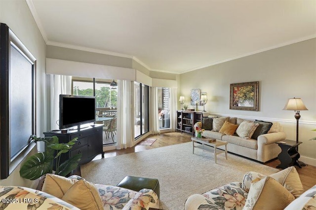 13 Harbourside Ln Unit 7155, Hilton Head Island, SC 29928 - living room with wood finished floors and ornamental molding