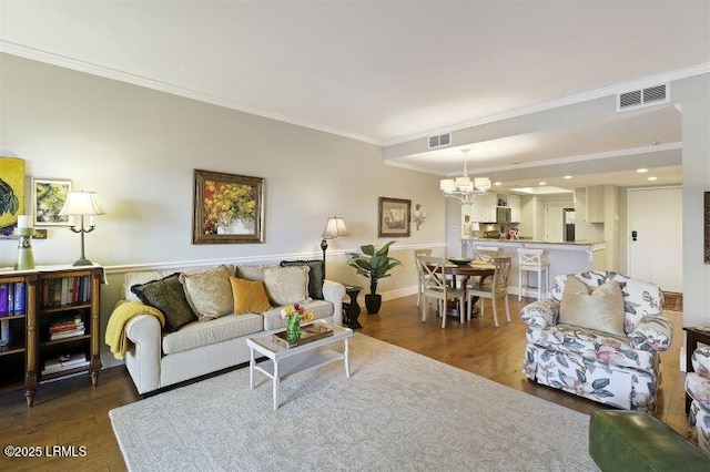 13 Harbourside Ln Unit 7155, Hilton Head Island, SC 29928 - living area featuring a chandelier, ornamental molding, wood finished floors, and recessed lighting