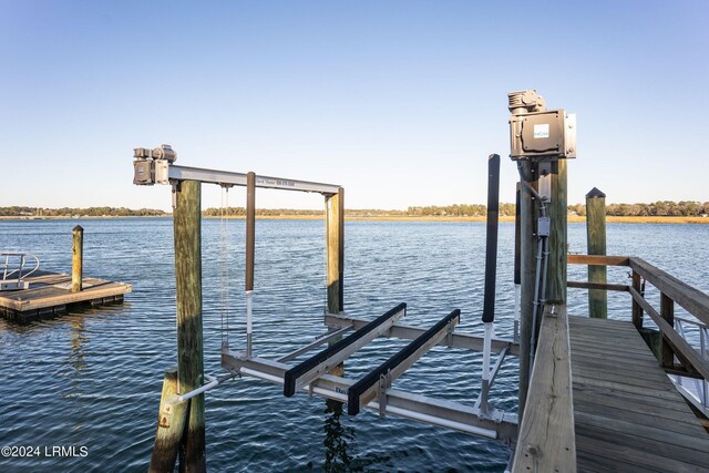 view of dock featuring a water view