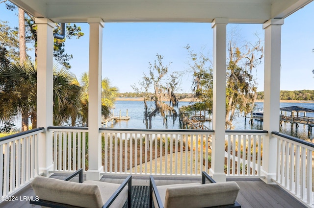 deck featuring a water view