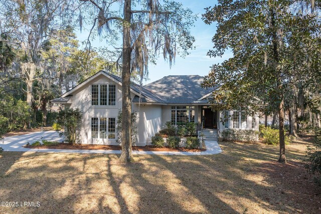 view of front of home with a front yard