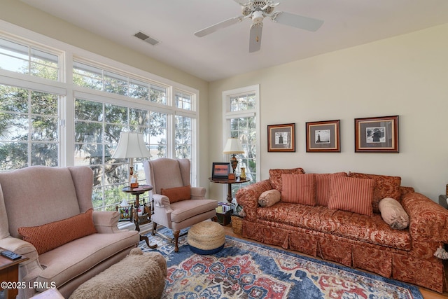 living room with ceiling fan