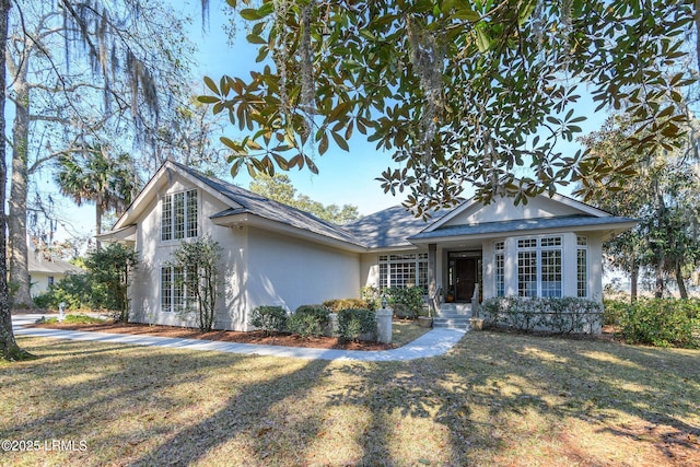 view of front of home with a front yard