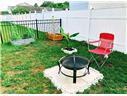 view of yard with an outdoor fire pit