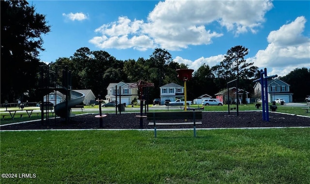 view of home's community featuring a lawn