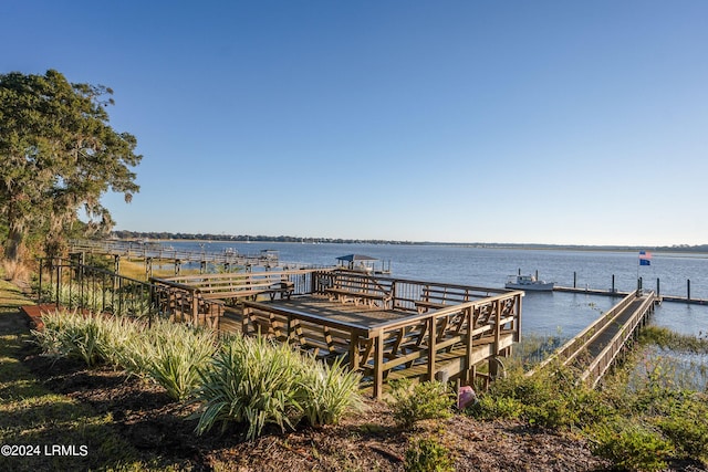 view of dock with a water view