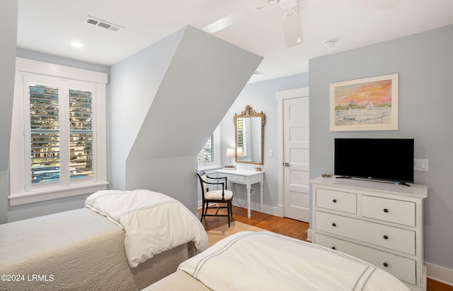 bedroom featuring light hardwood / wood-style flooring and ceiling fan