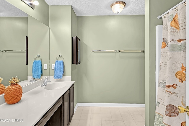 bathroom featuring vanity and a textured ceiling