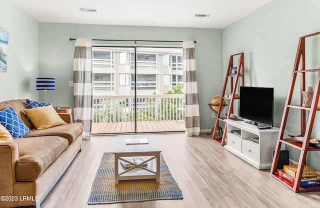 living room with wood-type flooring