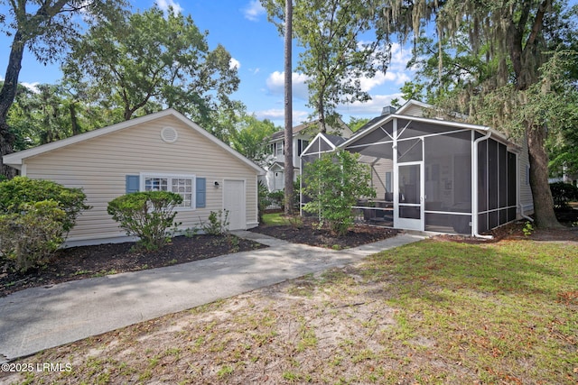 5 Regent Ave, Bluffton, SC 29910 - view of grassy yard with a sunroom