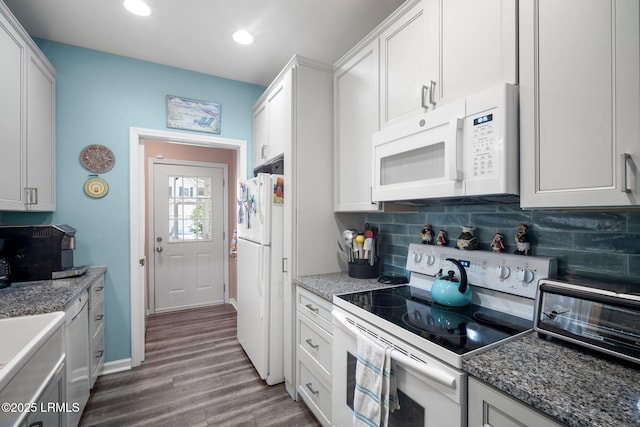 5 Regent Ave, Bluffton, SC 29910 - kitchen featuring white appliances, wood finished floors, tasteful backsplash, recessed lighting, and white cabinetry