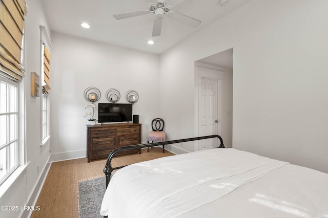 bedroom featuring a ceiling fan, recessed lighting, and baseboards